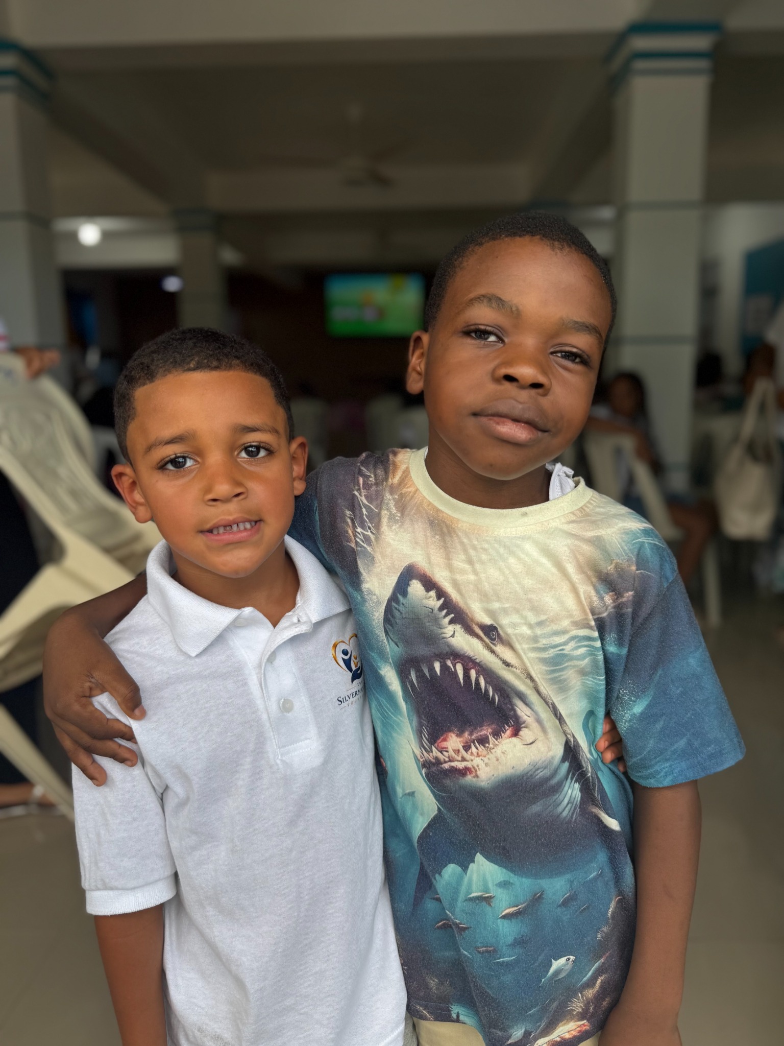 Two children together at a foundation activity