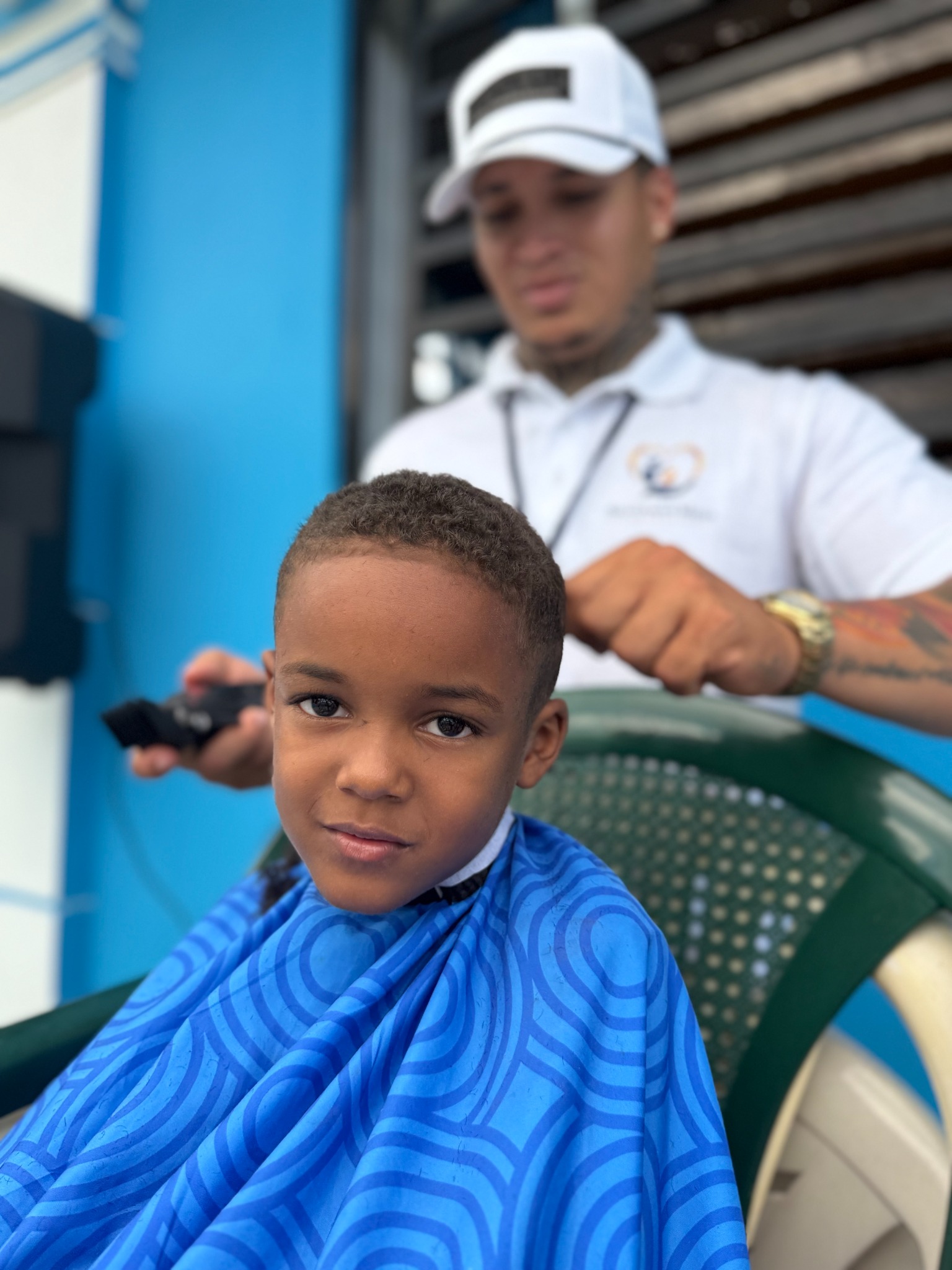 Child receiving a haircut