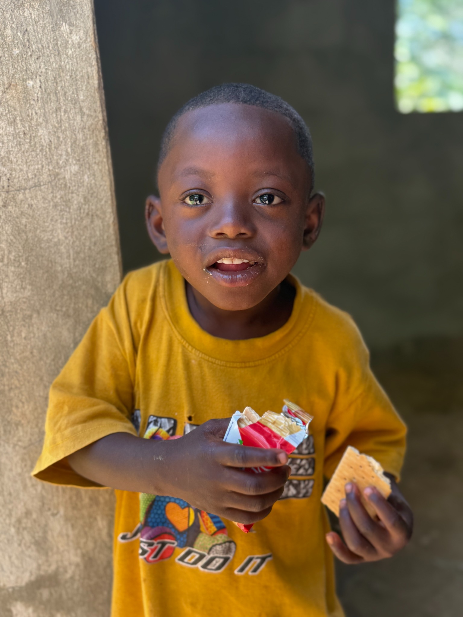 Child holding a snack