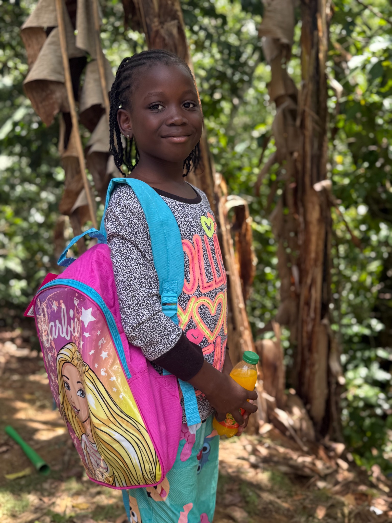 Girl with a backpack outdoors